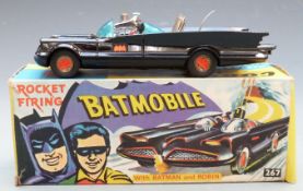 Corgi Toys diecast model Batmobile 1st type with no tow hook, black body, figures, bat logo hubs and