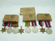 Royal Navy WWII boxed medals comprising 1939/1945 Star, Burma Star, Defence Medal and War Medal