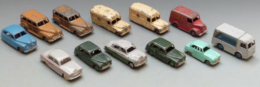 Twelve Dinky Toys diecast model vehicles including ambulances, Dunlop Trojan van, N.C.B Electric