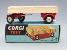 Corgi Toys diecast model Dropside Trailer with cream bed and red chassis, 100, in original box.
