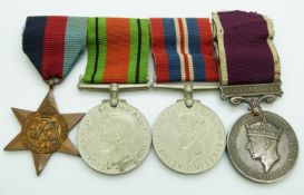 British Army WWII medals comprising 1939/1945 Star, Defence Medal, War Medal and Long Service & Good
