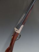 Gunmark Kestrel 20 bore side by side shotgun with engraved lock, trigger guard, underside and top