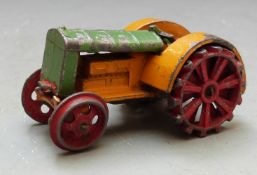 Dinky Toys diecast model Fordson N Tractor with yellow body, green bonnet and red wheels, 22E.