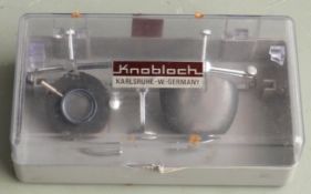 A pair of Knobloch marksman's shooting glasses, in original case.
