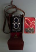 Microflex TLR camera by Micro Precision Products, having Micromar 77.5mm f 3.5 lens, in leather