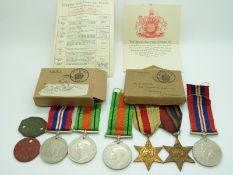 British Forces WWII boxed medals comprising Burma Star, Africa Star, Defence Medal and War Medal,