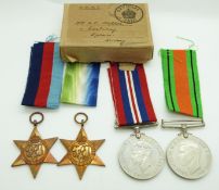 Royal Navy WWII boxed medals comprising 1939/1945 Star, Atlantic Star, Defence Medal and War Medal