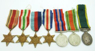 British Army WWII medals comprising 1939/1945 Star, France & Germany Star, Africa Star, Italy