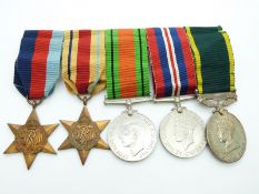 British Army WWII medals comprising 1939/1945 Star, Africa Star, Defence Medal, War Medal and