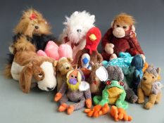 One-hundred-and-sixty-five large and small TY Beanie Baby animals, most with original tags.