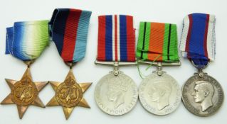Royal Navy WWII medals comprising 1939/1945 Star, Atlantic Medal, Defence Medal, War Medal and Royal