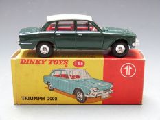 Dinky Toys diecast model Triumph 2000 with green body, white roof and red ineterior, 135, in