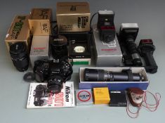 Nikon F-601 camera with 35-70mm 1:3.3-4.5 and 70-210mm 1:4-5.6 lenses, various boxes, instructions