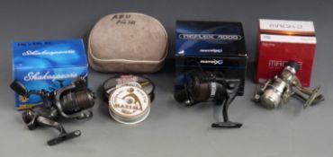 Three fixed spool fishing reels in boxes and a quantity of line, includes Sigma 30FS and Matrix