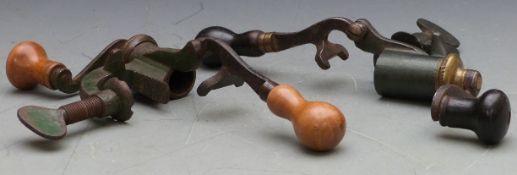 Two 12 bore steel and brass shotgun cartridge reloading tools.