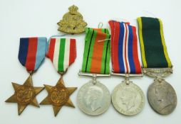 British Army WWII medals comprising 1939/1945 Star, Italy Star, Defence Medal, War Medal and