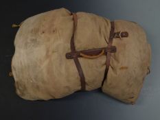 Military sleeping bag with leather strapping and handle