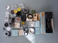 Mainly Leica camera accessories to include viewfinders, lens hoods, B.P.M bellows unit and mounts,
