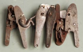 Three pairs of gun locks, all with engraved decoration, each approximately 11cm long.