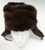 A Canadian beaver, rabbit or similar fur hat.