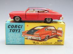 Corgi Toys diecast model Marlin Rambler Sports Fastback with red body, black roof and cream interior