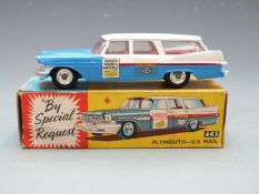 Corgi Toys diecast model Plymouth US Mail with blue and white body, red stripe and US Mail decals,