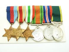 British Army WWII medals comprising 1939/1945 Star, Africa Star, Italy Star, Defence Medal, War