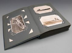 Royal Navy postcard album with over 100 cards from WWI through to the Cold War, some in colour