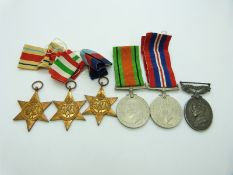 British Army WWII medals comprising 1939/1945 Star, Africa Star, Italy Star, Defence Medal, War