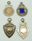 Four hallmarked silver football or similar sporting interest medals, one with enamel shield to front