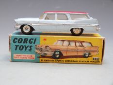Corgi Toys diecast model Plymouth Sports Suburban Station Wagon with pale blue body, red roof and