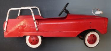 Murray or similar childs tinplate pedal car formed as a fire engine, length 105cm