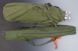 Two military aluminium framed collapsible camp beds with carry bags