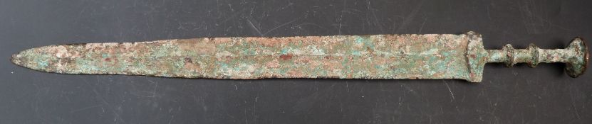 Chinese 'Archaic' sword with stepped handle, tapering blade and pitted patina, blade length 45cm