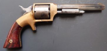 Lucius W Pond .32 six-shot single action rimfire revolver with brass frame shaped wooden grips,