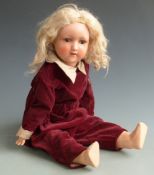 Handwerk bisque headed doll with open mouth, weighted brown eyes, blonde hair and articulated