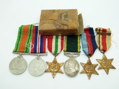 British Army WWII medals comprising 1939/1945 Star, Africa Star, Italy Star, Defence Medal, War