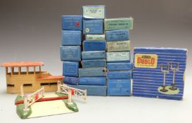 Twenty-four Hornby Dublo 00 gauge wagons, tankers, points, signals, crossing track sets etc, all but