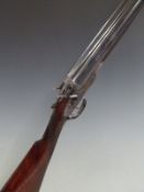Unnamed 12 bore side by side hammer action shotgun with engraved lock, hammers, trigger guard,