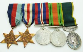 British Army WWII medals comprising 1939/1945 Star, France & Germany Star, Defence Medal, War