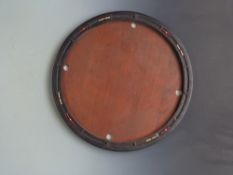 Early carrom or similar circular board game with ebonised frame, 74cm in diameter.
