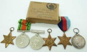 Royal Navy WWII medals comprising 1939/1945 Star, Pacific Star, Atlantic Star, Defence Medal, War