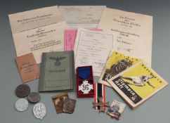 A quantity of WWII and earlier Nazi German medals, tinnies, 25 year medal, award certificates and
