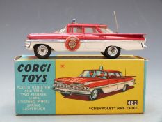 Corgi Toys diecast model Chevrolet Fire Chief with red and white body, plated radiator and trim, two