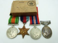 British Army WWII medals comprising 1939/1945 Star, Defence Medal, War Medal and Territorial