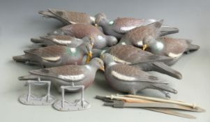 Ten plastic pigeon decoys, some by Sport Plast on stands