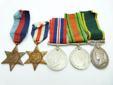 British Army WWII medals comprising 1939/1945 Star, France & Germany Star, Defence Medal, War