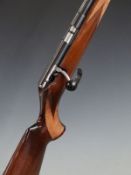 Anschutz .22 bolt action rifle with chequered semi-pistol grip and forend, sling suspension loops,