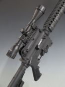 Mossberg 715T .22 assault style rifle with pistol grip, adjustable stock, spare magazines, sound