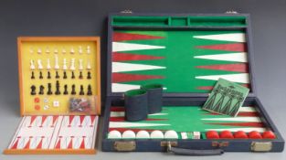 A de luxe backgammon set in faux snake skin leather case together with a travelling chess and
